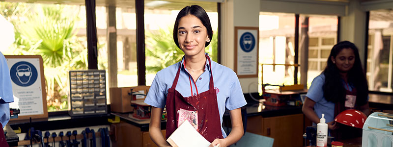 girl stood in workshop