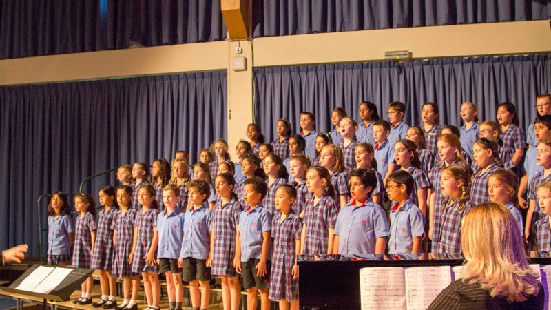 Students singing in a choir